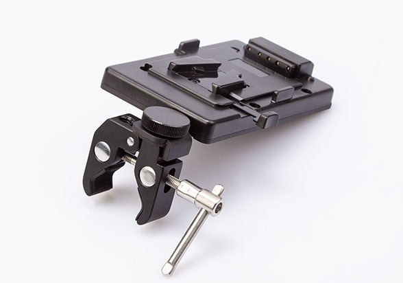 SWIT S-7200S | V-mount battery plate with clamp for tripod mount, and D-tap socket.